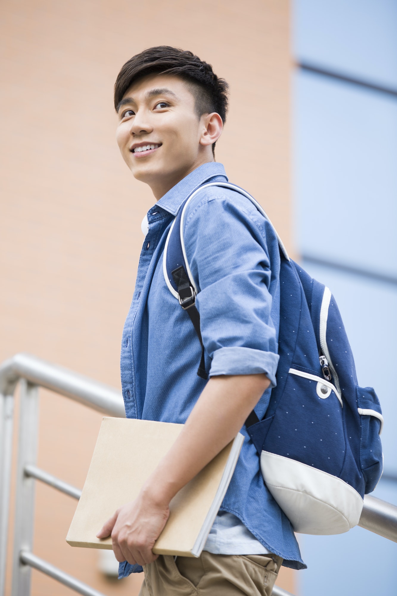 male college student outside library